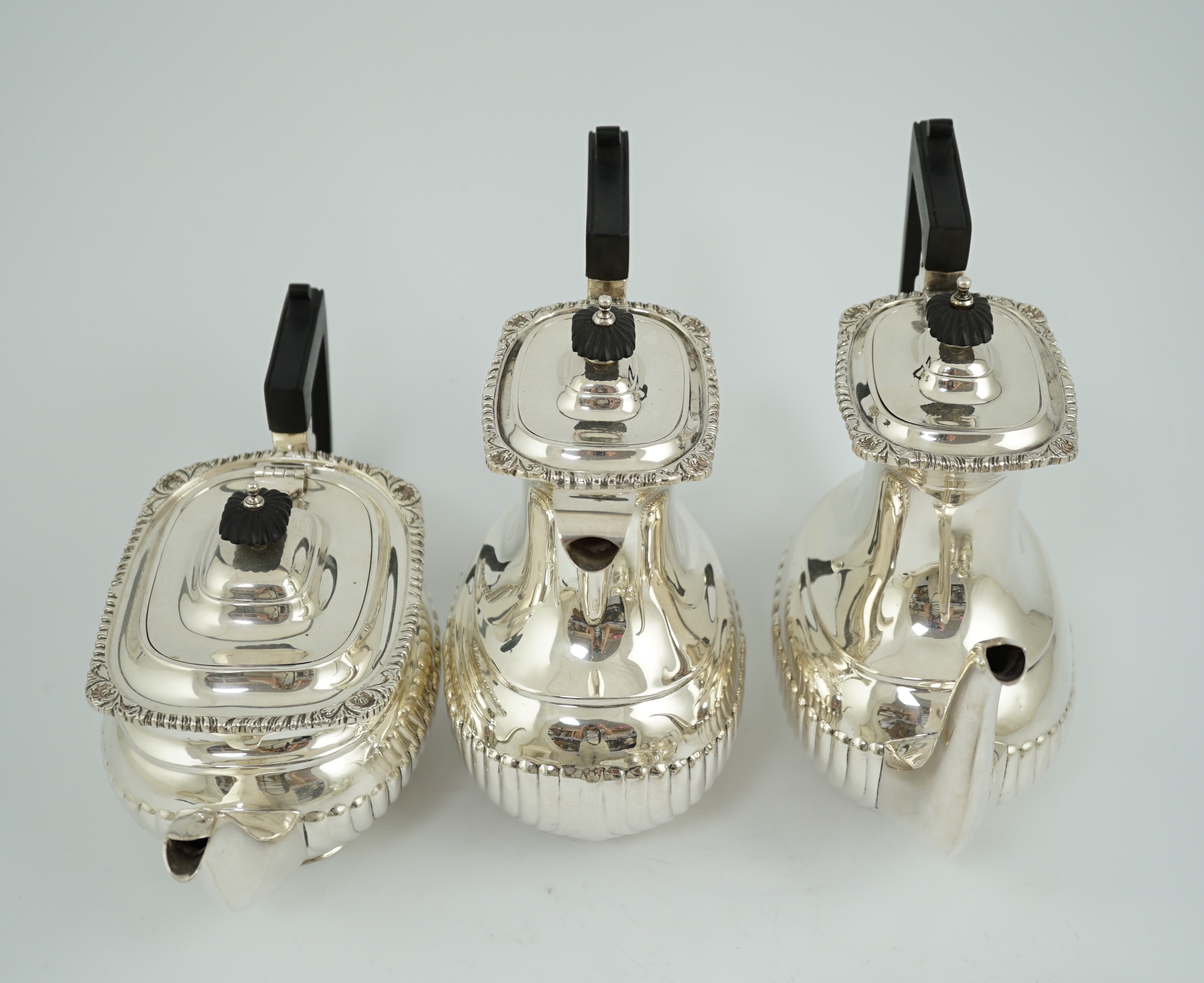 An Elizabeth II five piece demi-fluted silver tea service, by Roberts & Belk